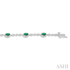 5x3 MM Oval Cut Emerald and 1/20 Ctw Round Cut Diamond Bracelet in 14K White Gold