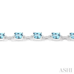 7x7 MM Cushion Shape Blue Topaz and 1/20 Ctw Round Cut Diamond Fashion Bracelet in Sterling Silver