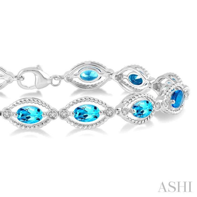 6x4 MM Oval Cut Blue Topaz and 1/10 Ctw Round Cut Diamond Semi-Precious Bracelet in Sterling Silver