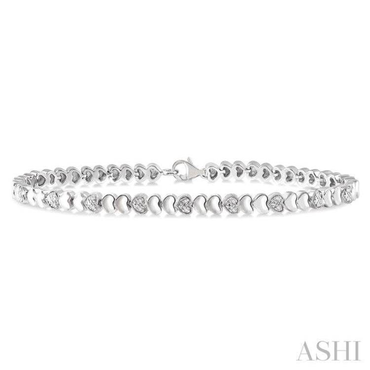 1/6 Ctw Puffed Heart Plain and Round Cut Diamond Fashion Bracelet in Sterling Silver