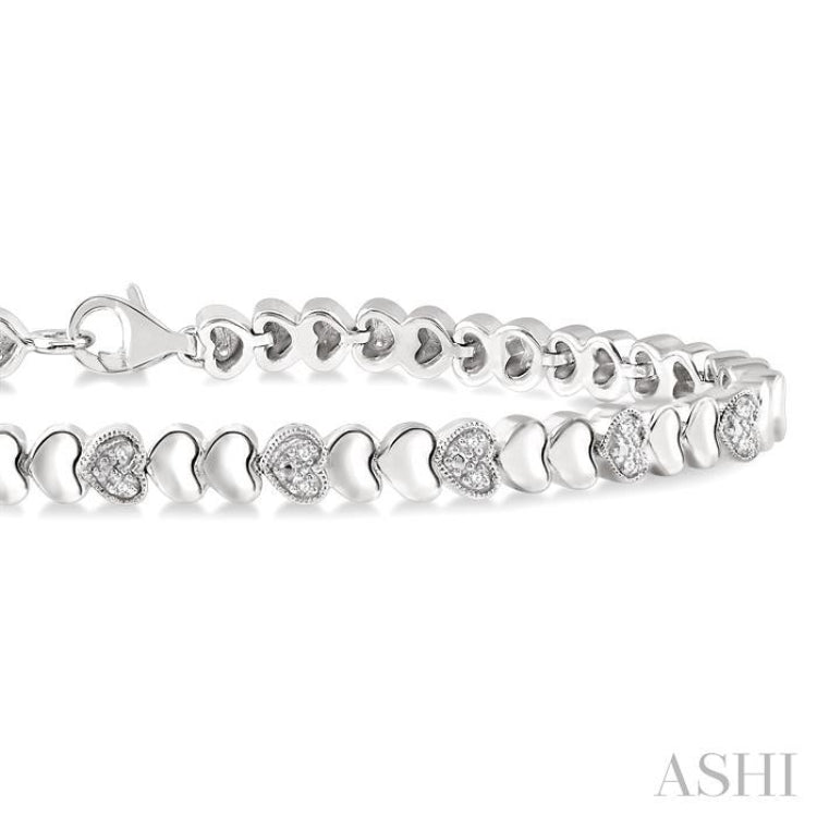 1/6 Ctw Puffed Heart Plain and Round Cut Diamond Fashion Bracelet in Sterling Silver