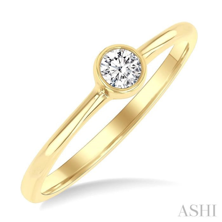 1/6 Ctw Petite Bezel Set Round Cut Diamond Fashion Ring in 10K Yellow Gold